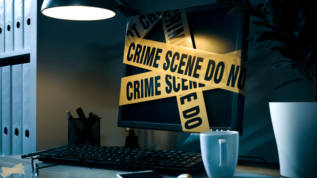 Women and murder media - A laptop covered in yellow crime scene tape, symbolizing how danger, survival stories, and emotional survival now unfold online.