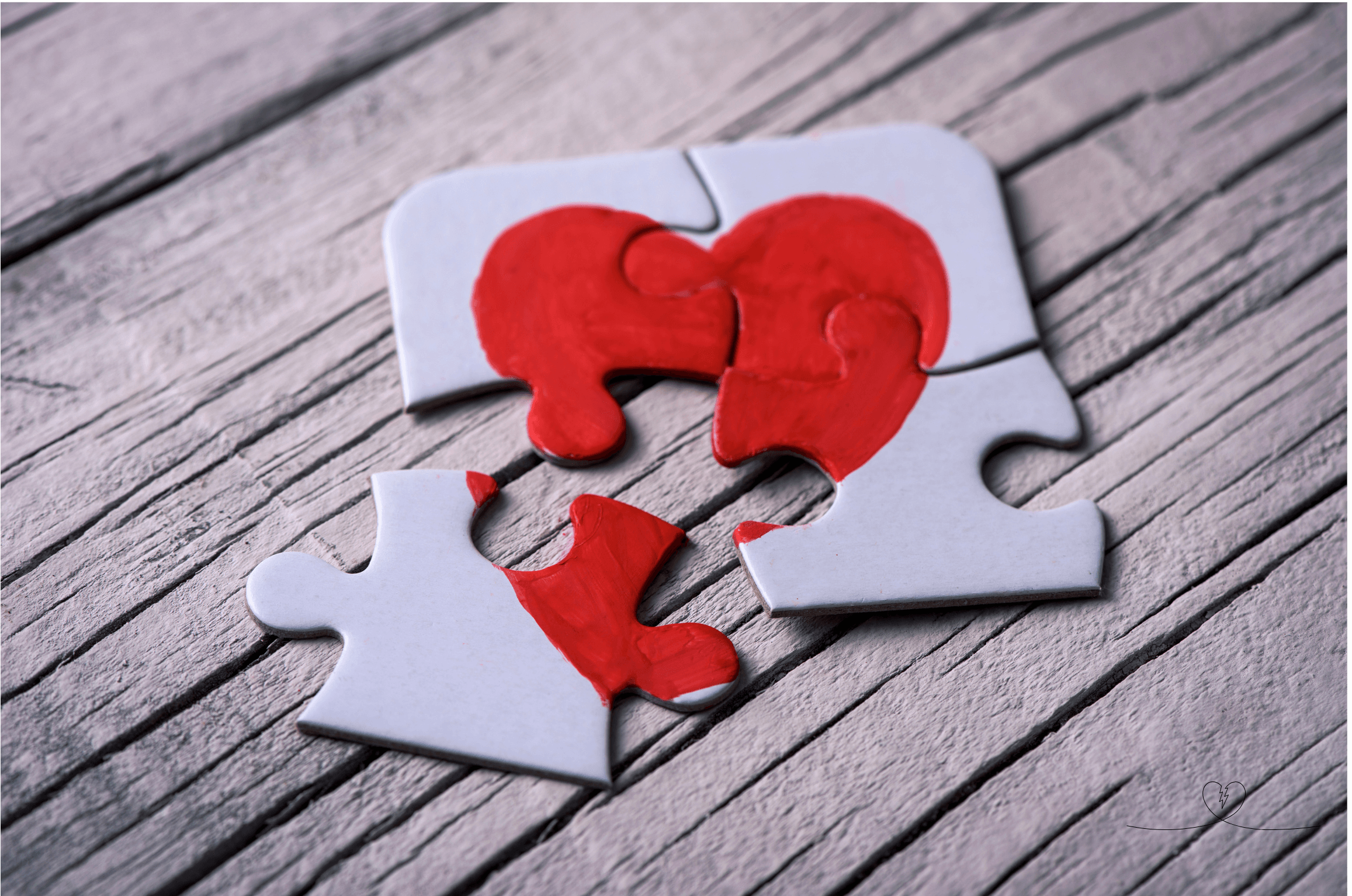 Close-up of a heart-shaped puzzle with a missing piece, symbolizing the emotional incompleteness after a breakup.