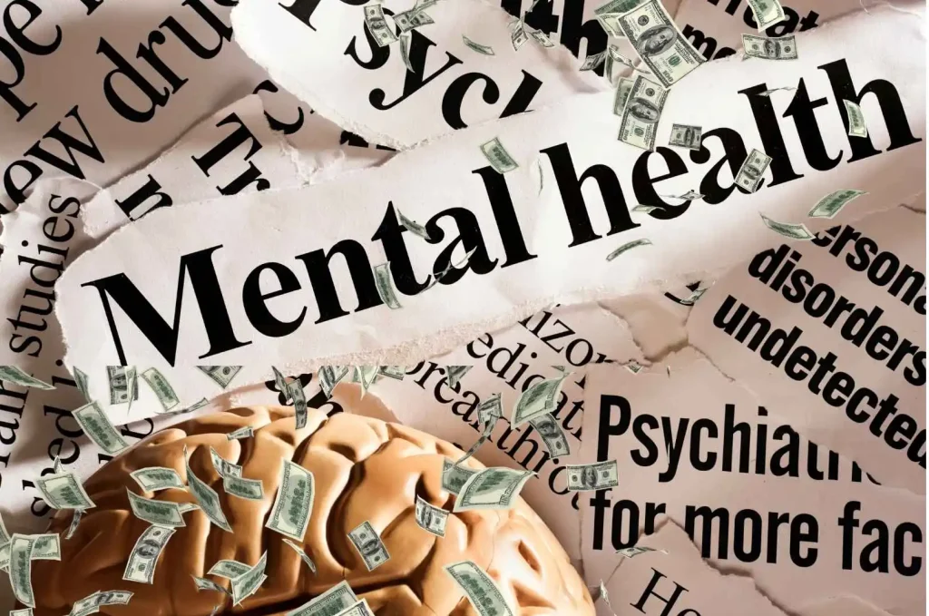 Image of the word “Mental Health” surrounded by dollar bills and fragmented headlines about psychiatry and disorders, layered over a brain.