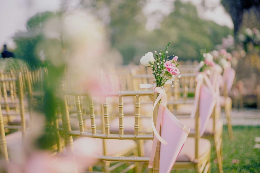 Empty wedding chairs with floral decoration, symbolizing emotional space and boundaries