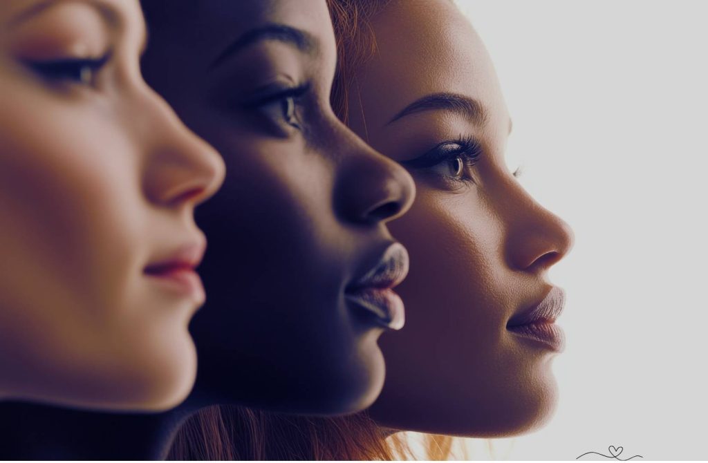 Microaggressions - Three women of different ethnicities in profile, facing the same direction.