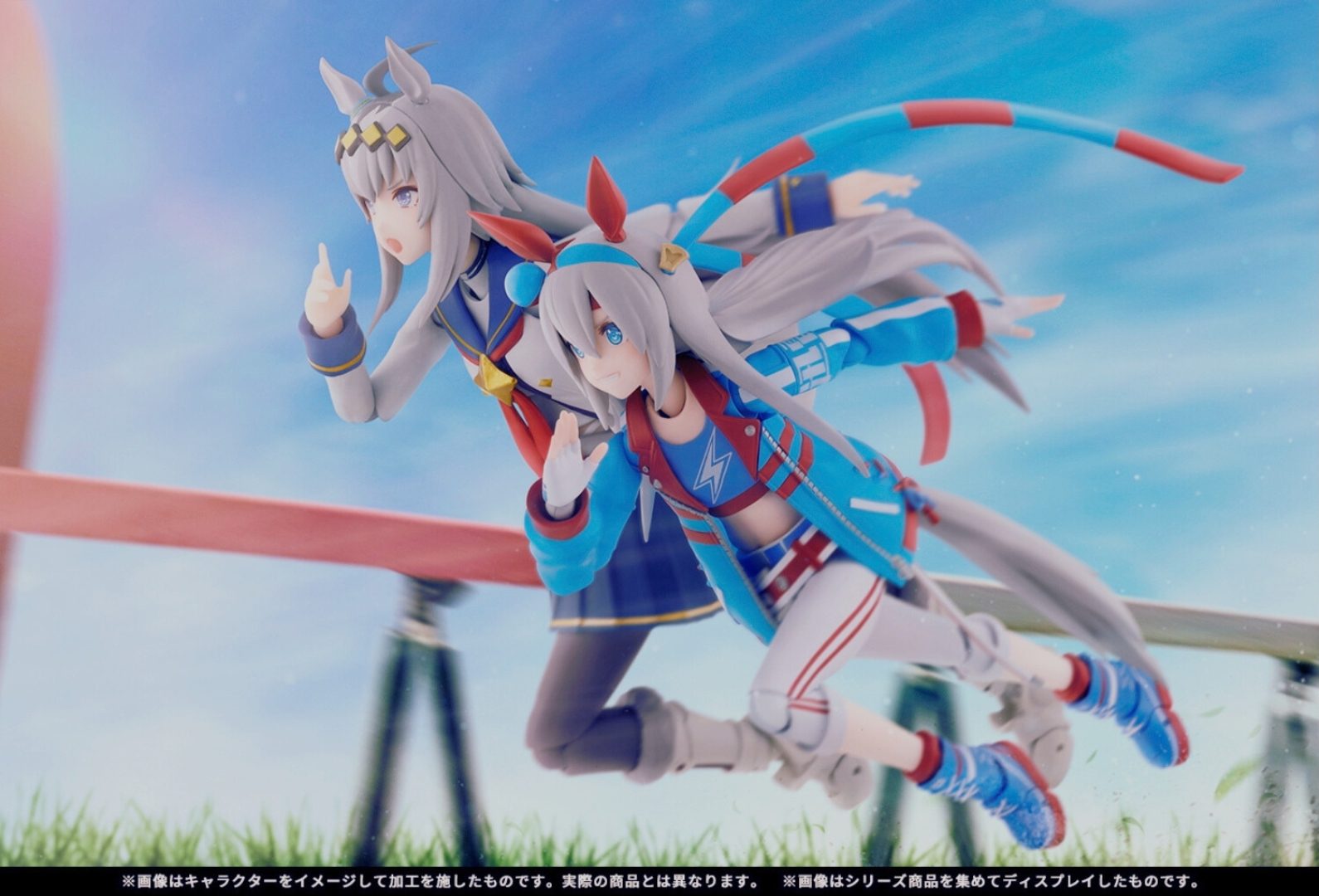 Figures of Oguri Cap and Tamamo Cross sprinting side by side under a blue sky, inspired by the Uma Musume: Cinderella Gray anime rivalry.